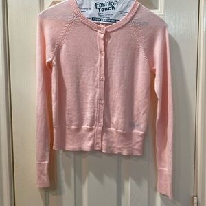 Pink sweater with clear Diamond-cut buttons